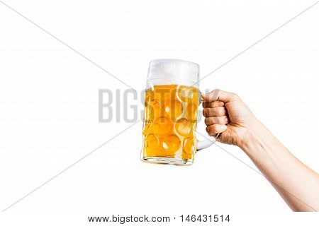 Hand of unrecognizable man holding a beer mug. Oktoberfest. Studio shot on white background, isolated. Copy space.