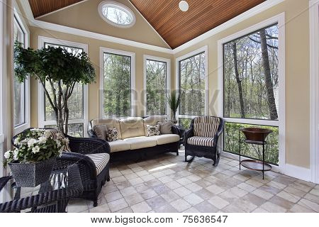 Sun room in luxury home with circular window