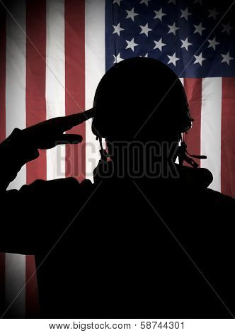 American (USA) soldier saluting to USA flag