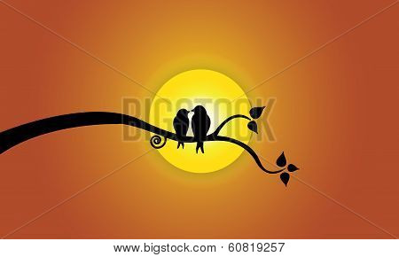 Happy Young Love Birds On Tree Branch During Sunset & Orange Sky