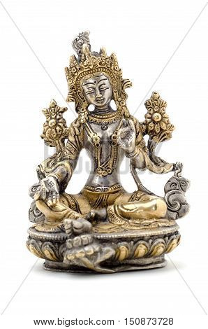 Statuette of Green Tara on a white background. Vajrayana deity quick to help and protection. Om tare tuttare ture soha.