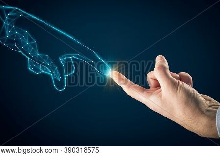 Artificial Intelligence (ai) And Industry 4.0 Concept. Human Hand And Graphics Hand Symbolizing Pcb 