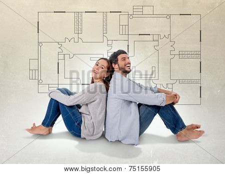 Young Couple Dreaming And Imaging Their New House In Real State Concept