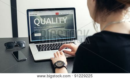 Shot of a young lady working with laptop, woman's hands on notebook computer and smart phone, buisin