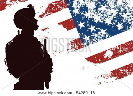 US soldier with the American Flag on the background