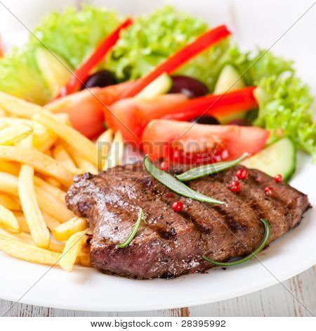 Grilled beefsteak with french fries