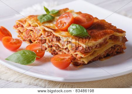 Italian Lasagna With Fresh Basil On A Plate. Horizontal