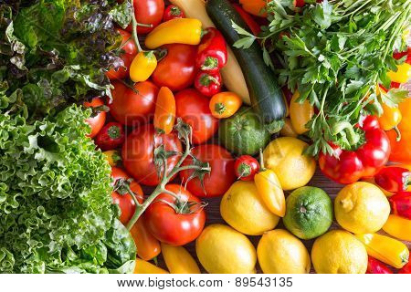 Fresh Organic Vegetables On Top Of Wooden Table