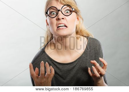 Psychology frustration emotions feelings concept. Furious woman yelling. Nedry girl angered frustrated screaming out of wrath.