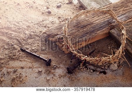 Easter Background Depicting The Crucifixion With A Rustic Wooden Cross, Crown Of Thorns And Nails.