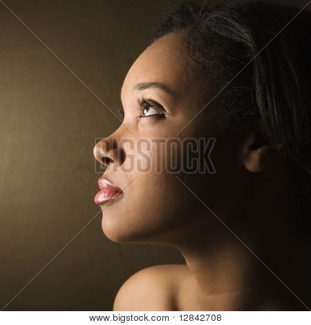 Profile of serious African-American young adult female.