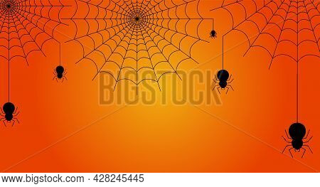 Black Spider Hanging From Cobweb On Orange Background With Copy Space. Halloween Concept. Design For