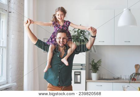 Father's Day. Happy Family Daughter Hugs His Dad