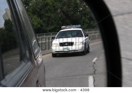 Police In Rearview Mirror