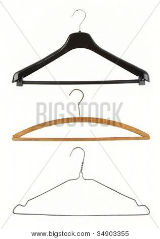 Three coat hangers isolated on plain background