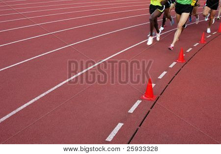 Running athletes at the stadium