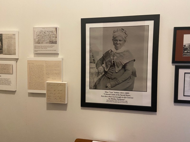 Eliza "Liza" Nebbit was a young enslaved girl who was given to Philippine Duchesne. In 1825, she traveled to Louisiana with Mother Aude and Mother Hardey to establish a foundation, St. Michael's, in Convent, La. In a letter dictated to Reverend Mother Randall in 1880, Eliza called herself, “Colored Child of the Sacred Heart, first slave what was brought in dis Convent by Mother Duchesne.”