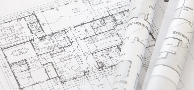 Architect rolls and architectural plan,technical project drawing