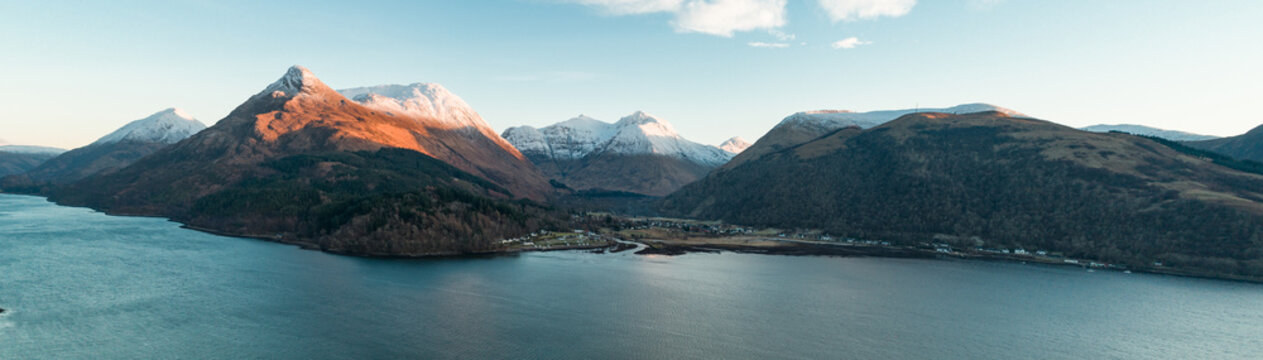 Aerial View of Glencoe and the Mountains Surrounding The Small Town in Scotland