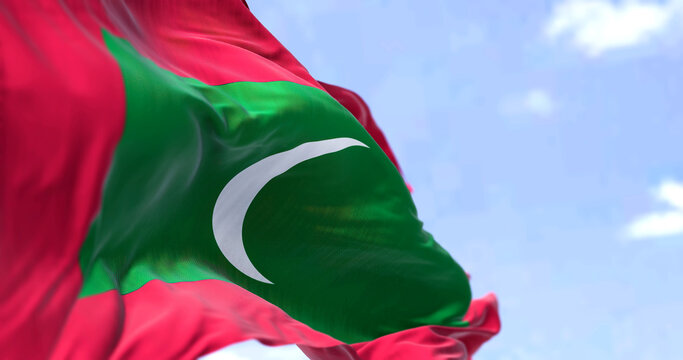 Detail of the national flag of Maldives waving in the wind on a clear day