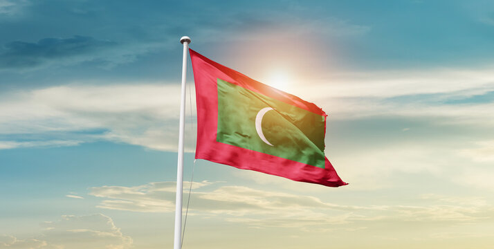 Maldives national flag cloth fabric waving on the sky - Image