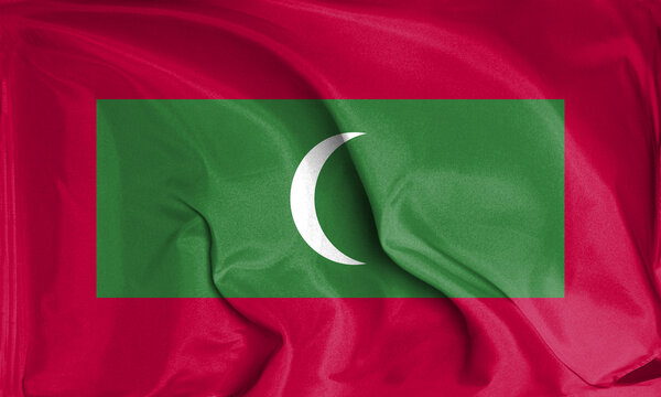 An up close view of Maldives flag flying textures