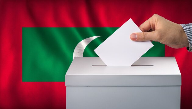 モルディブの国旗の背景と投票箱と投票する手。選挙。(Maldives flag background and ballot box and hand voting. election.)
