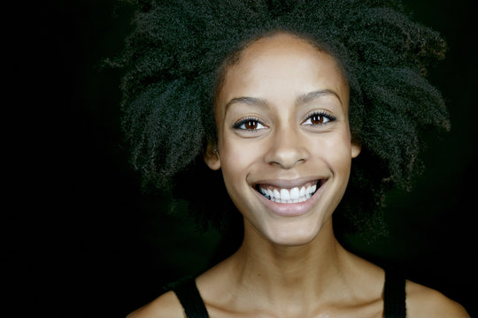 Mixed race woman smiling