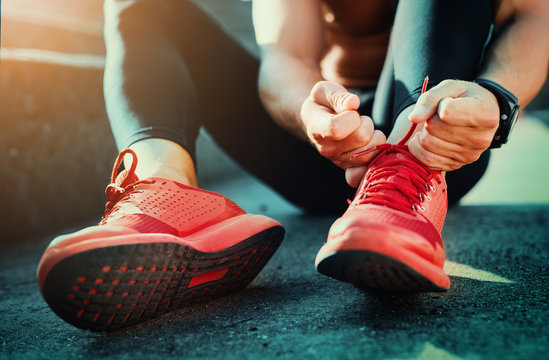 Tying sports shoes