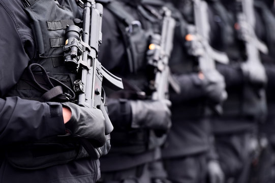 Soldier with machine gun during military parade