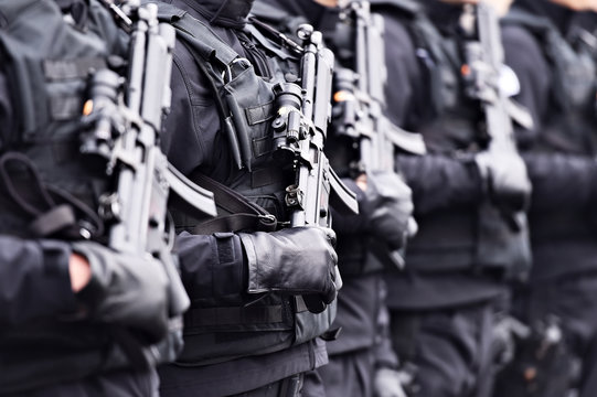 Soldier with machine gun during military parade