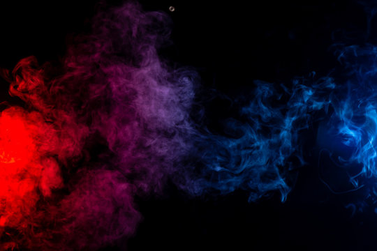 abstract blue red and purple smoke on black background