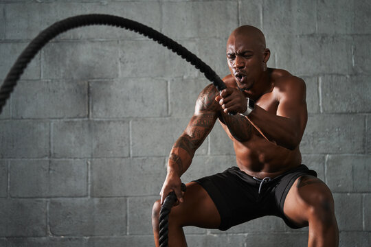 Black man doing intense sports training