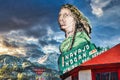 Image of retro 50s neon sign on a restaurant bar in the mountains. Navajo Hogas