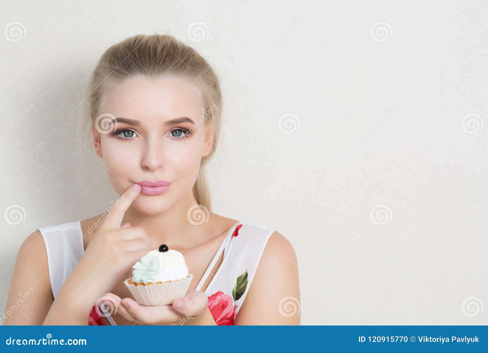 Delightful Blonde Model Enjoying Tasty Dessert with Butter Cream Stock ...