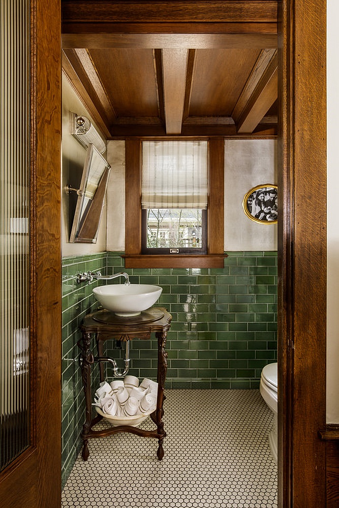 green subway tile in bathroom