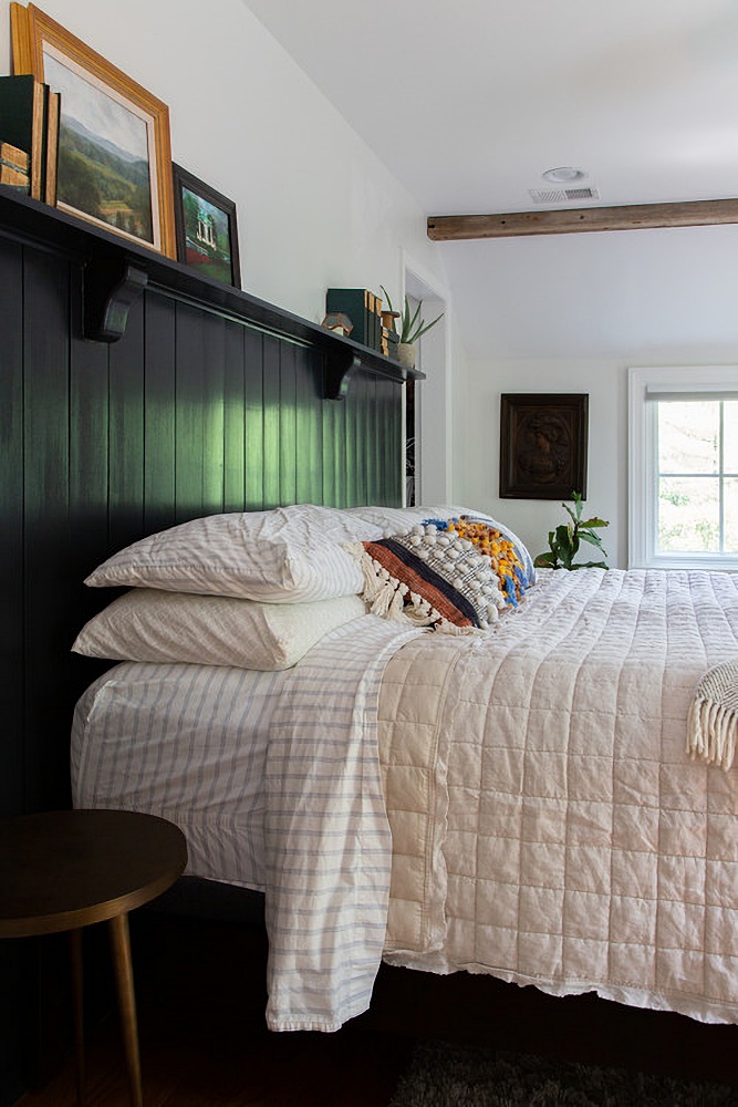 dark green wall in bedroom