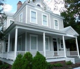 Take a small step to change your exterior by painting your front door an. Historic Home with Grey Exterior Paint traditional ...