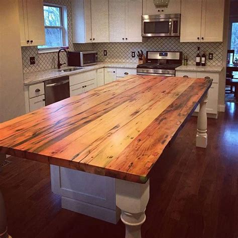 Multi tier wood top sink island…i love the wooden counter tops. This amazing photo is seriously a formidable style theme ...