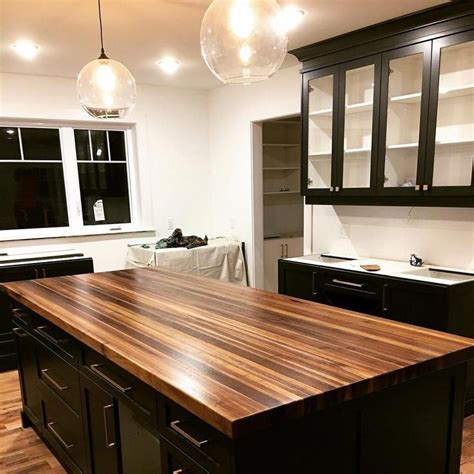 Do not use the old hardware and drill new holes so the top will be secured tightly. Exquisite laminate countertops in 2020 | Wood top island ...