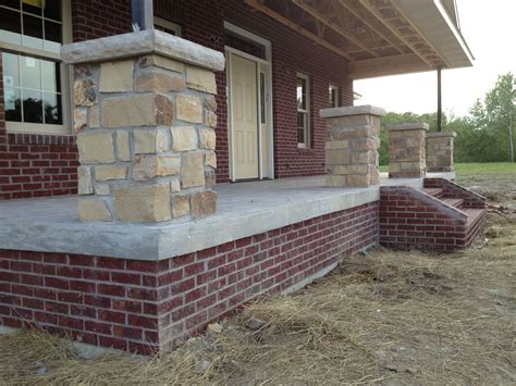 A small railing/balcony has been added around the top. Stone porch column with dark red brick. | My Dream Home ...