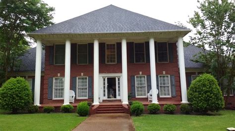 We offer front porch columns with lifetime warranties engineered for ease of installation in a variety of the finest most durable materials. Southern Colonial Traditional red brick two-story mansion ...