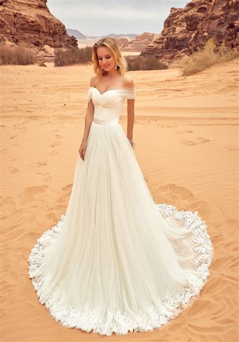 Wedding party at marco beach ocean resort. Best Beach Wedding Dresses for 2019… | Business Bridal