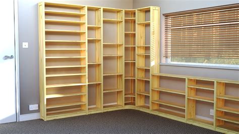 Plastic book bins slide onto a deep shelf for convenient organization. Best 15+ of Book Shelving Systems