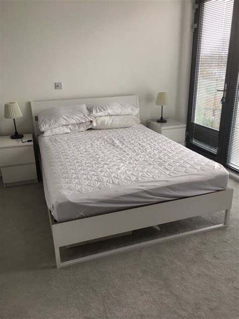 For your bed, might we suggest an ikea headboard. King size bed, Ikea Trysil white frame including slats and mattress | in Chiswick, London | Gumtree