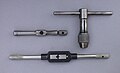 Two "Bar" tap wrenches and a "T" style tap wrench