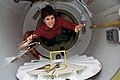 Janice Voss floating through the spacelab tunnel