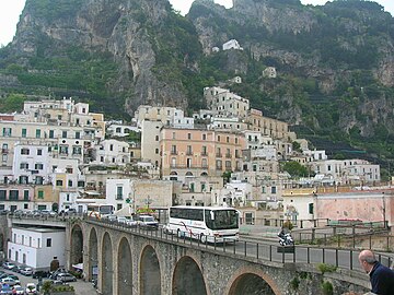 coastal arch bridge and road to Amalfi, rocks.