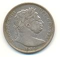 Half-Crown coin of George III, 1816. The portrait, known to collectors as the "bull-head George," was by the Italian engraver Benedetto Pistrucci, who was unable to engrave it from life since the King was insane