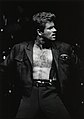 English: George Michael performing on stage during the Faith World Tour in 1988.